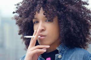Young Woman Smoking Cigarette
