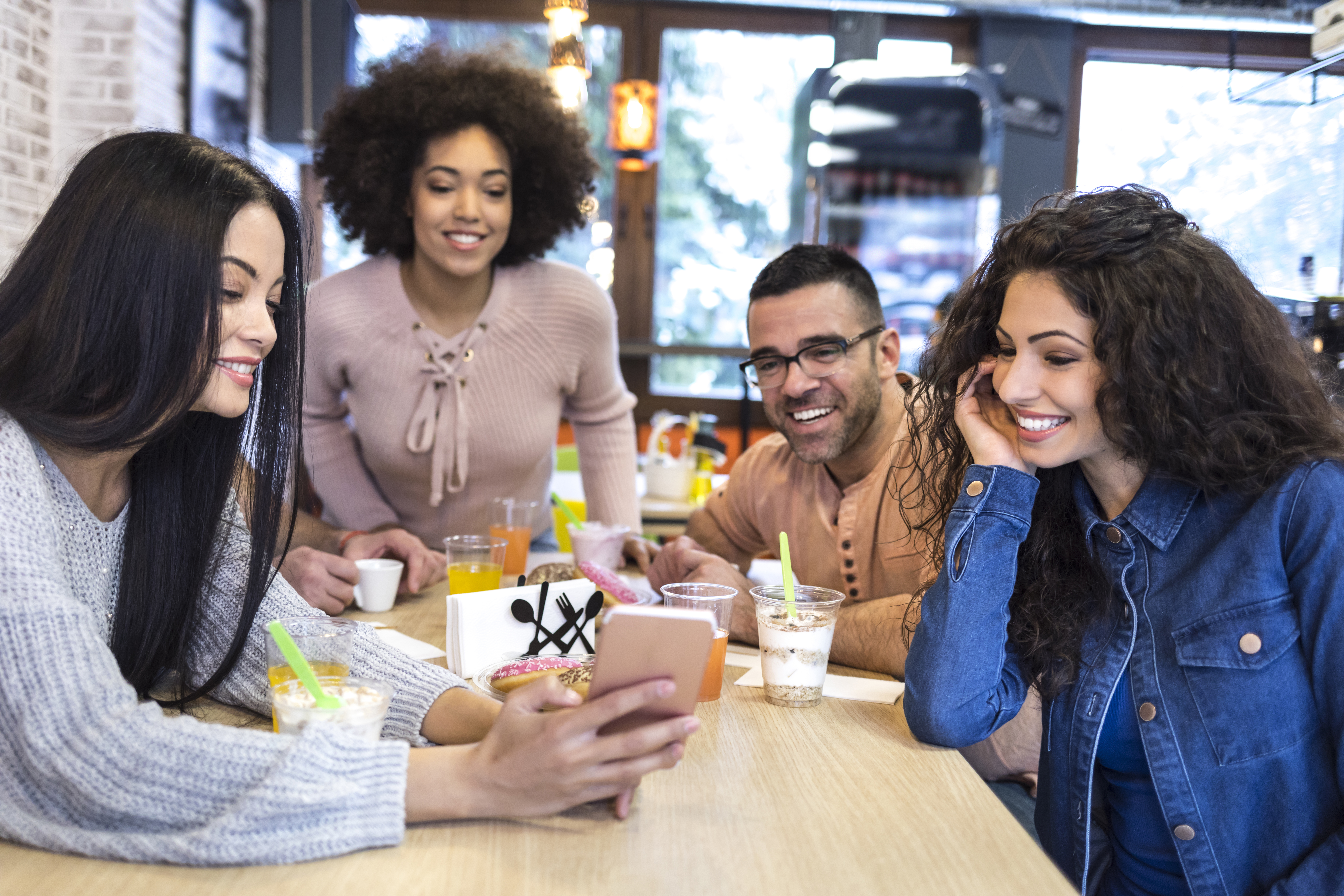 Selfie with coworkers in fast food restaurant