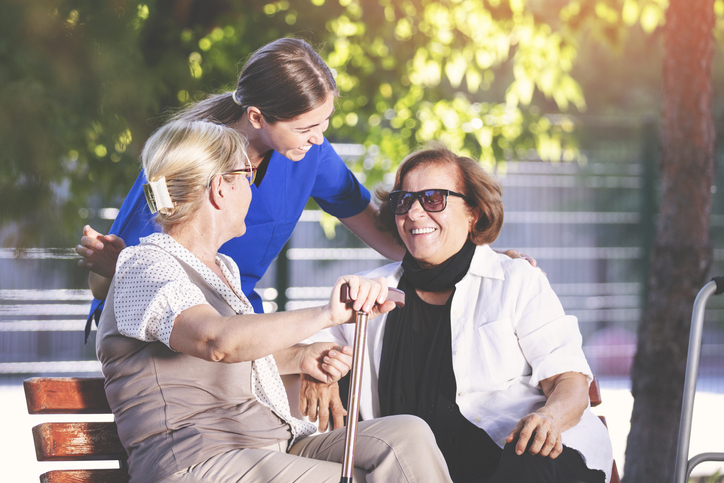 Nurse helping old women for comfort and care