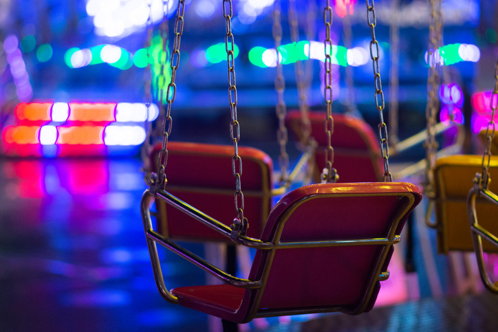 Close-Up Of Swing Ride At Night