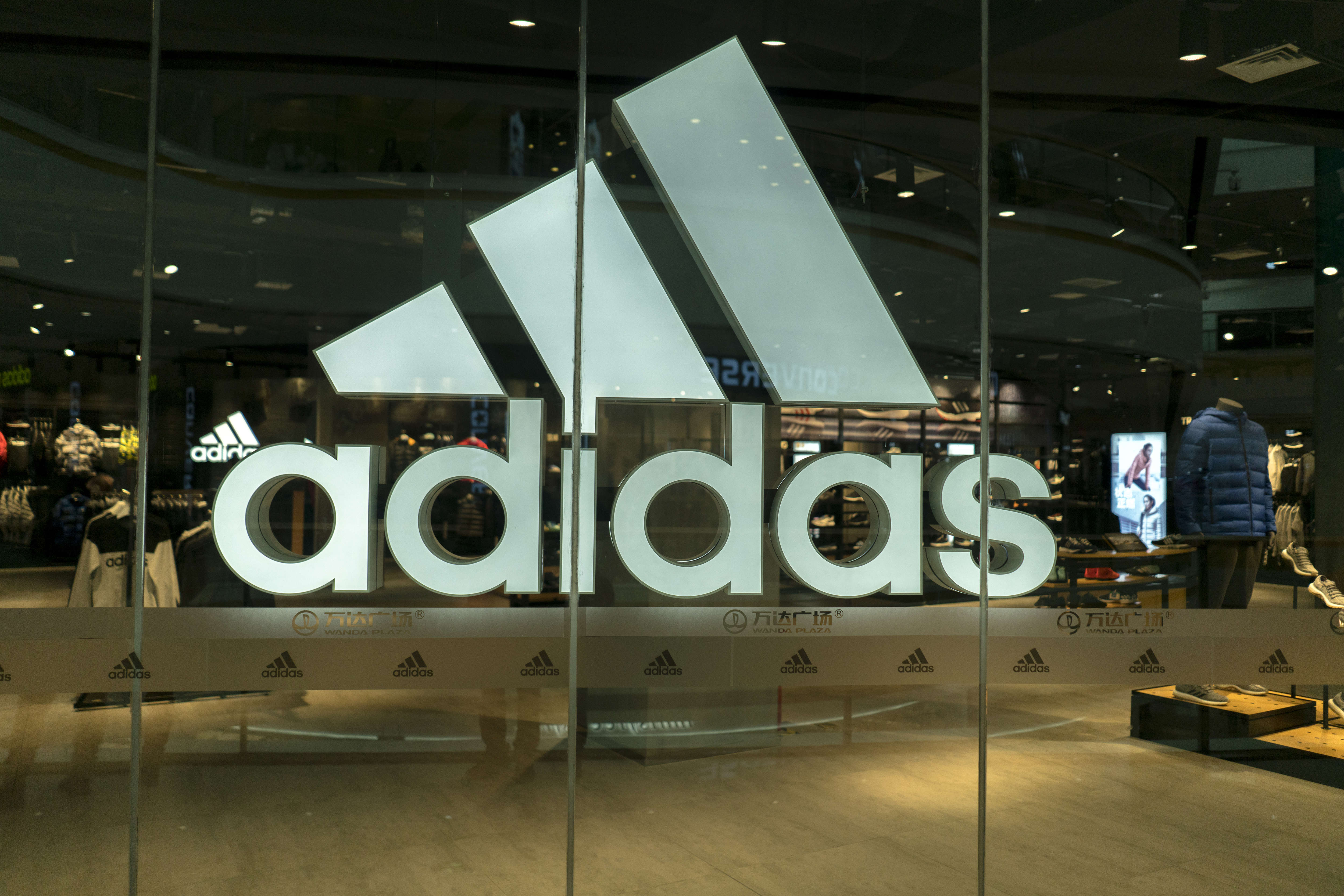 Adidas shop in a Wanda department store. Adidas's third...