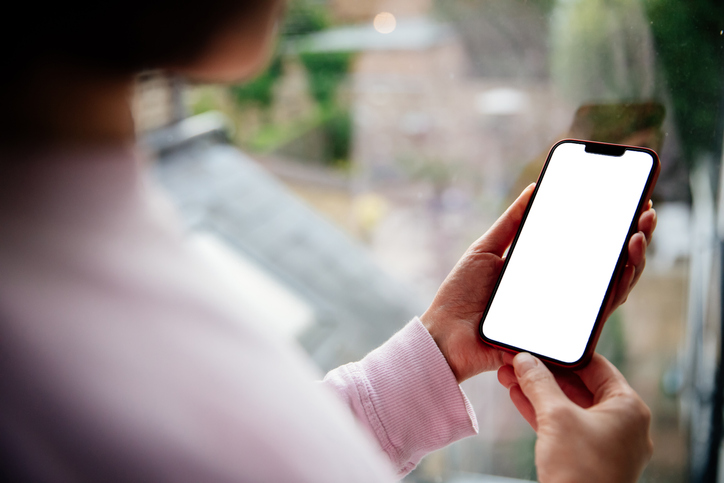 Woman using phone blank screen