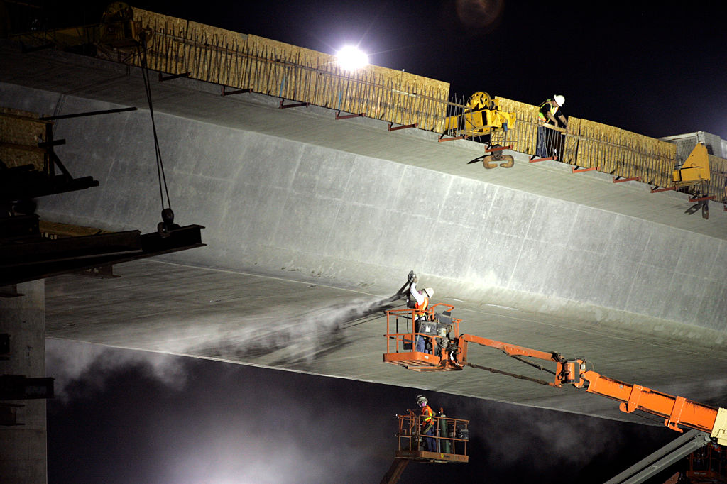 Riverside, Aug. 18, 2007    Night crew is busy in finishing one of the 2 sweeping 'flyover' conn