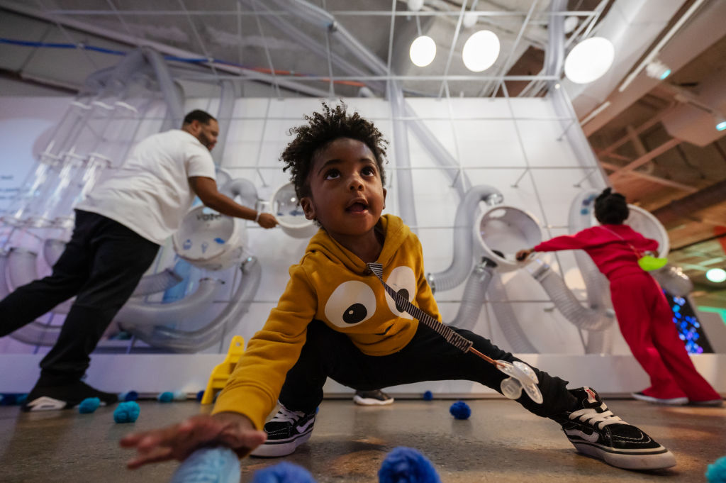 WASHINGTON, DC - FEBRUARY 17: Hunter Phillips, 1, picks up a po