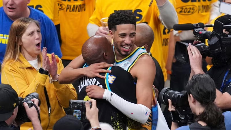 Indiana Pacers guard Tyrese Haliburton (0) hugs his father John Haliburton following Game 5 of an NBA basketball first-round playoff series against the Milwaukee Bucks, Tuesday, April 29, 2025, in Indianapolis.