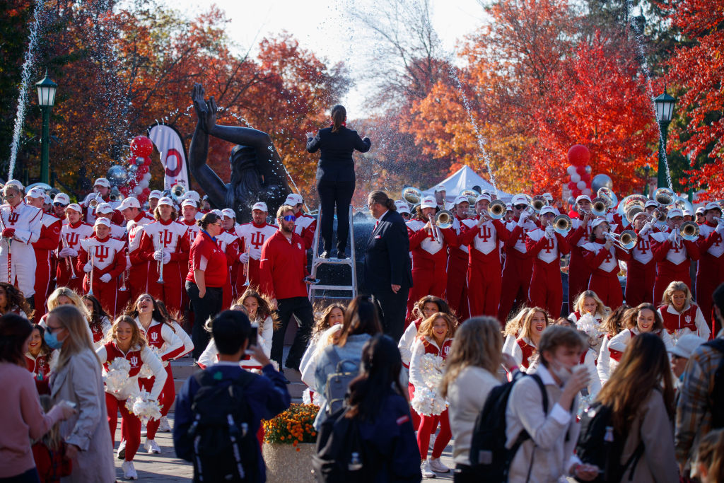 The Indiana University Marching Hundred and RedSteppers...